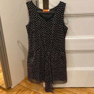 Black sleeveless dress with white stars